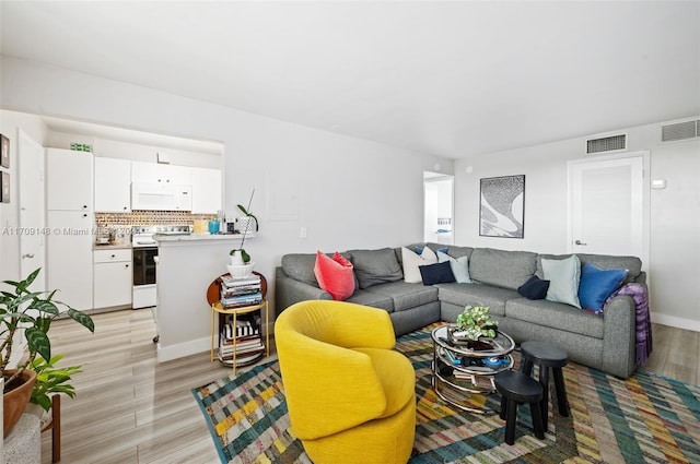 living room with light wood-type flooring