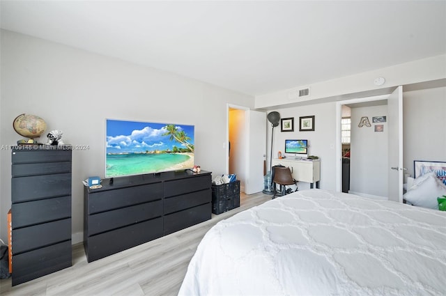 bedroom featuring light hardwood / wood-style flooring