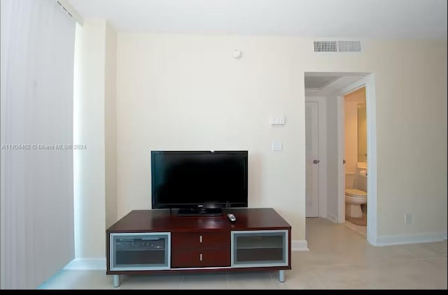 living room with light tile patterned floors