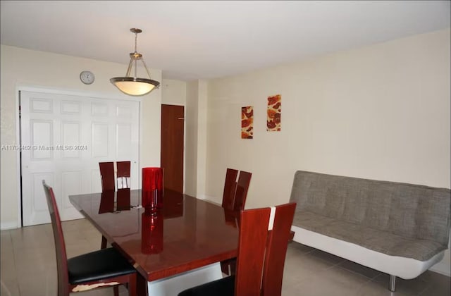 view of tiled dining space