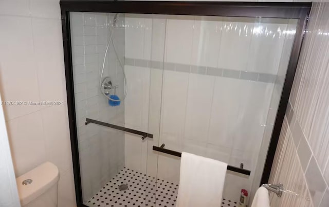 bathroom featuring an enclosed shower