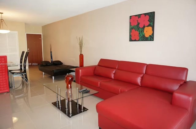 living room with tile patterned flooring