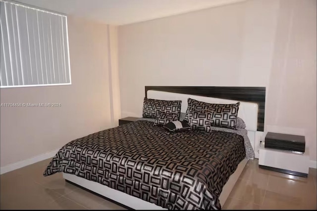 bedroom with tile patterned flooring