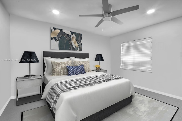 carpeted bedroom with ceiling fan