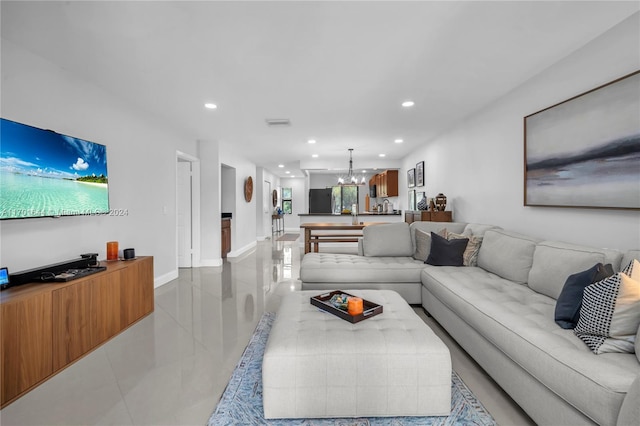 living room featuring a chandelier