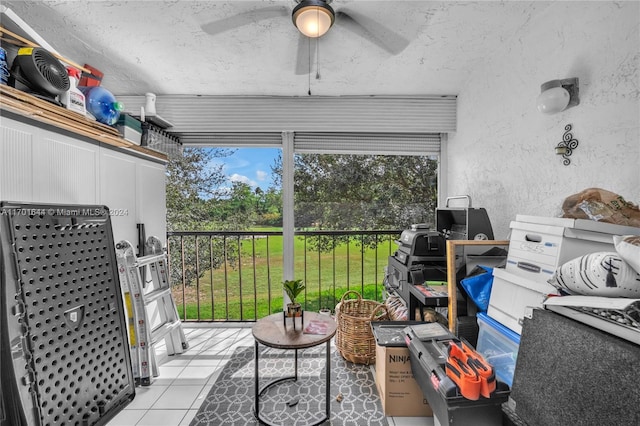 sunroom / solarium with ceiling fan