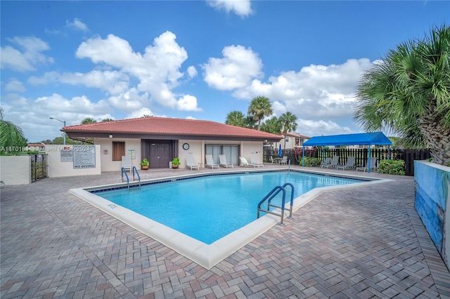 view of pool featuring a patio area