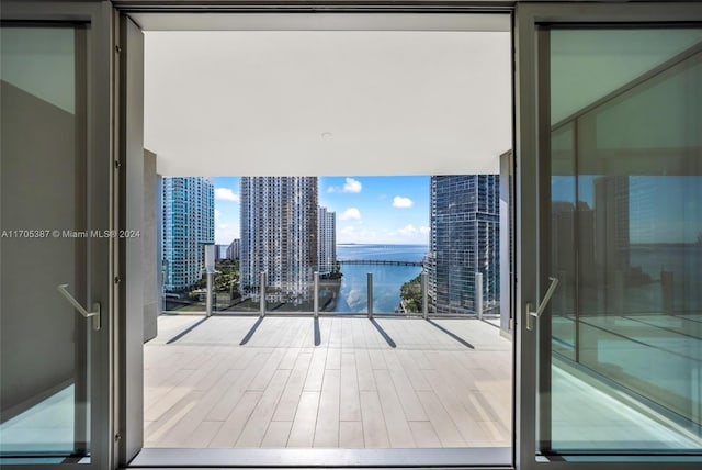 balcony featuring a water view