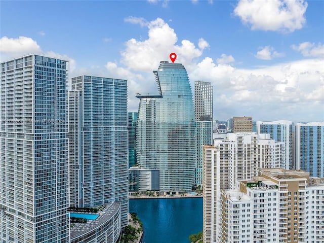 property's view of city with a water view