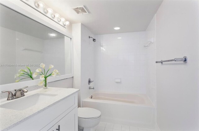 kitchen featuring a textured ceiling, white appliances, sink, light tile patterned floors, and white cabinets