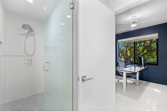 bathroom with a shower with shower door