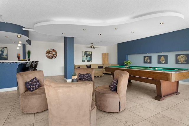 recreation room with a textured ceiling, ceiling fan, billiards, and baseboards