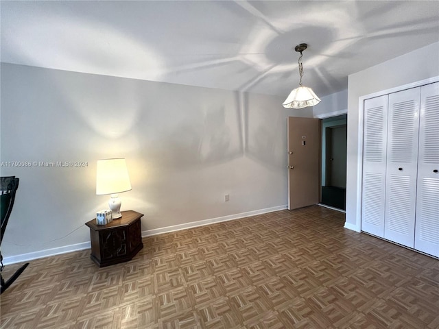 interior space with parquet flooring