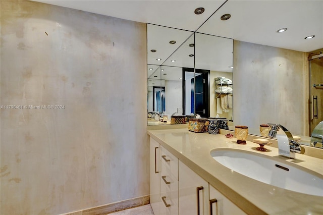 bathroom featuring hardwood / wood-style floors and vanity