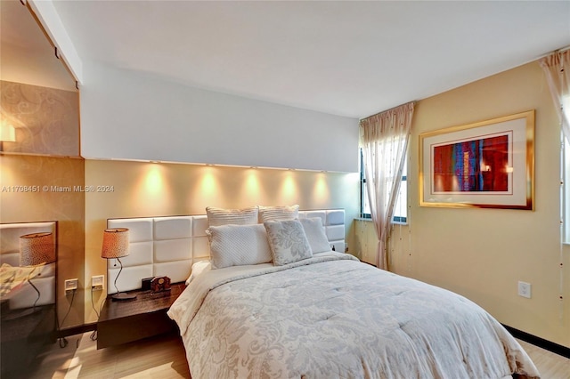 bedroom featuring light hardwood / wood-style flooring