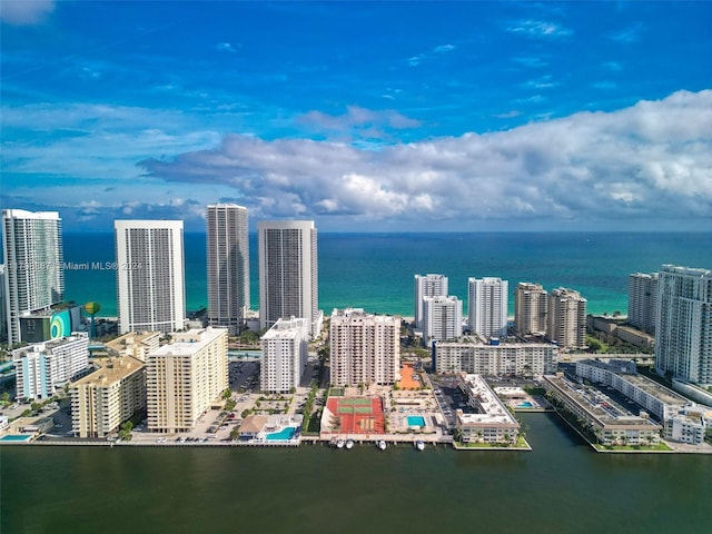 birds eye view of property featuring a water view