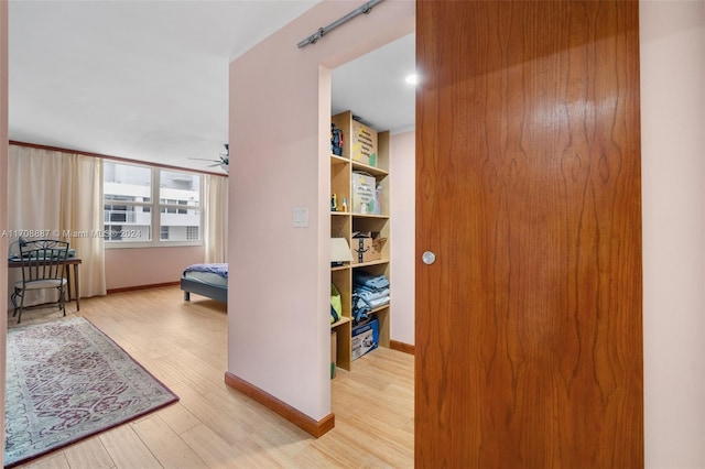 hall featuring light hardwood / wood-style floors