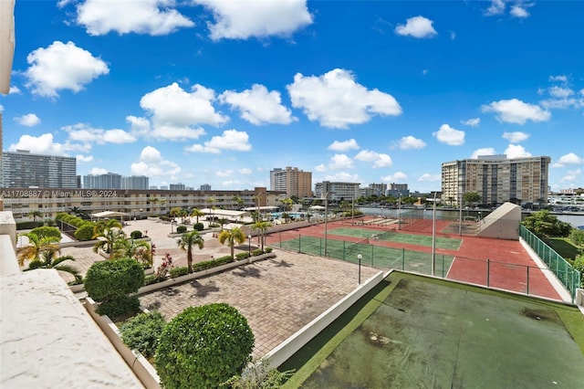 exterior space with tennis court