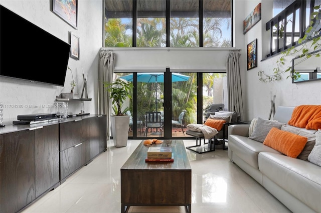 living room with light tile patterned flooring