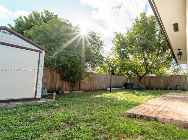 view of yard with a patio area