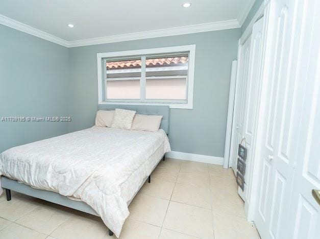 tiled bedroom with ornamental molding