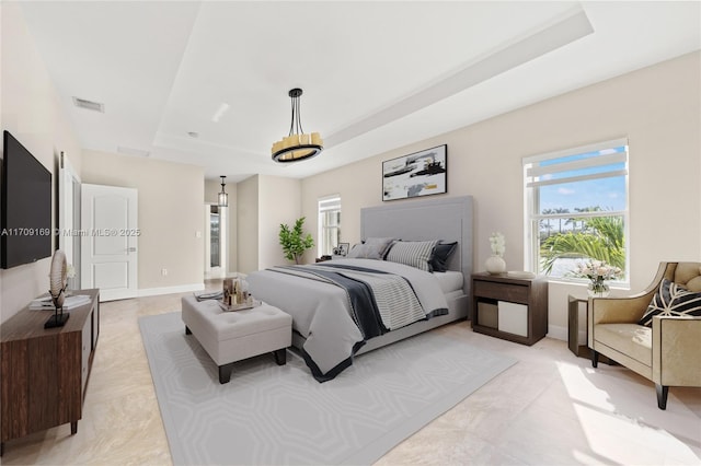 bedroom featuring a tray ceiling