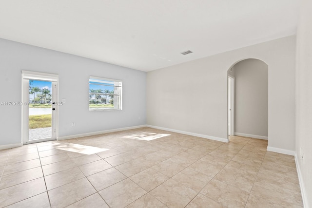 view of tiled spare room