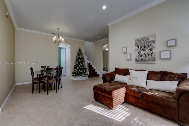 living room featuring crown molding, light tile patterned floors, and an inviting chandelier