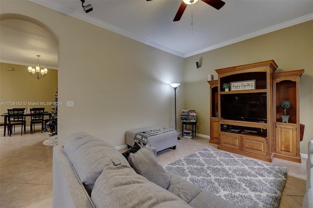 tiled living room featuring ceiling fan with notable chandelier and ornamental molding