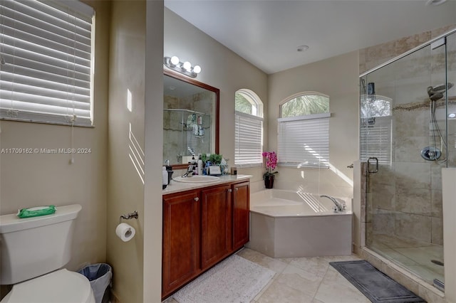 full bathroom featuring vanity, independent shower and bath, and toilet