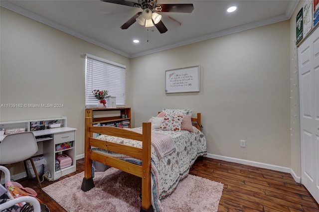 bedroom with dark hardwood / wood-style flooring, ceiling fan, and crown molding