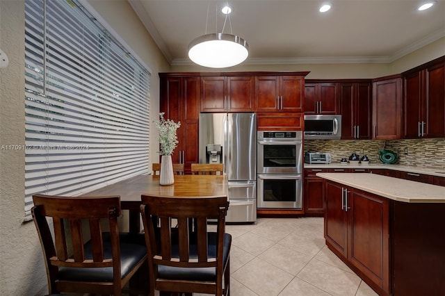 kitchen with decorative backsplash, appliances with stainless steel finishes, crown molding, and light tile patterned flooring