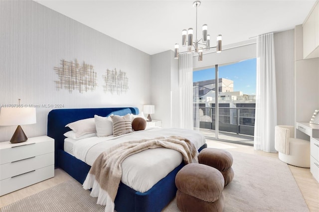 bedroom with an inviting chandelier