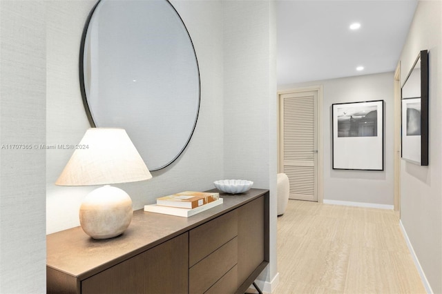 corridor featuring light hardwood / wood-style floors