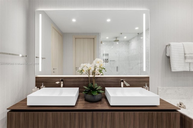 bathroom with vanity and walk in shower