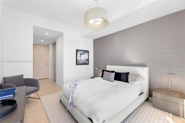 bedroom featuring light hardwood / wood-style floors