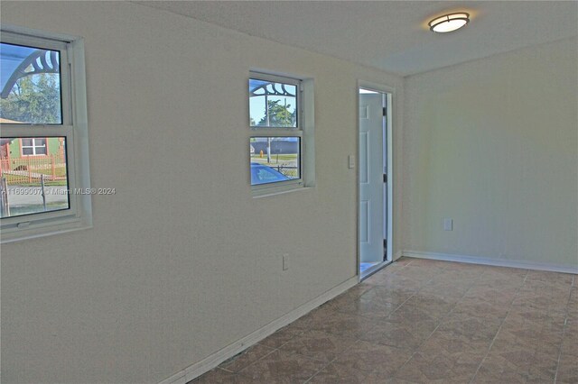 1918 NW 82nd St, Miami, FL 33147 - empty room featuring baseboards