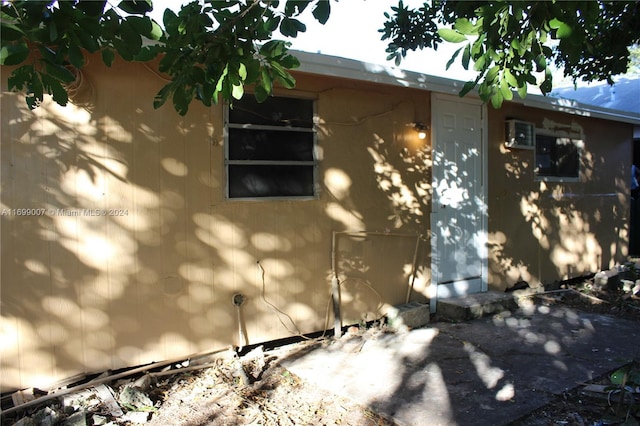 view of side of home featuring a patio