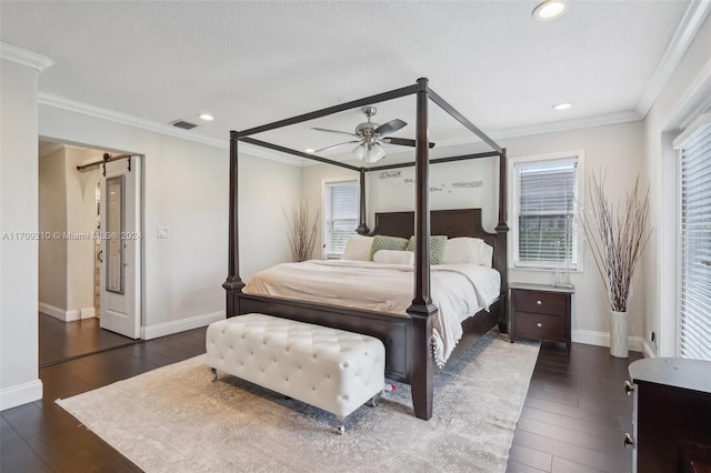 bedroom with dark hardwood / wood-style flooring, ceiling fan, and crown molding