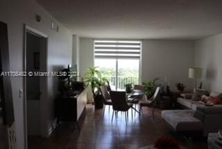 dining space with dark hardwood / wood-style floors