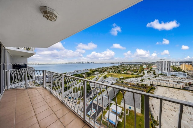 balcony featuring a water view