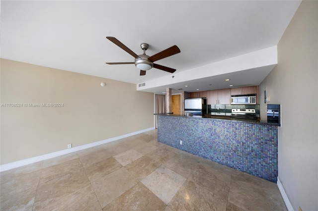 kitchen featuring stainless steel appliances and ceiling fan