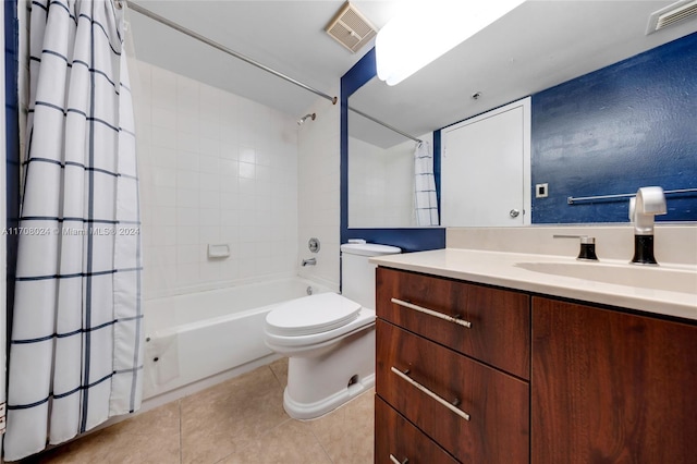 full bathroom featuring tile patterned flooring, vanity, shower / tub combo, and toilet