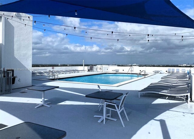 pool featuring a patio