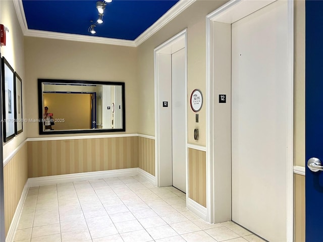 hallway featuring elevator, ornamental molding, and light tile patterned floors