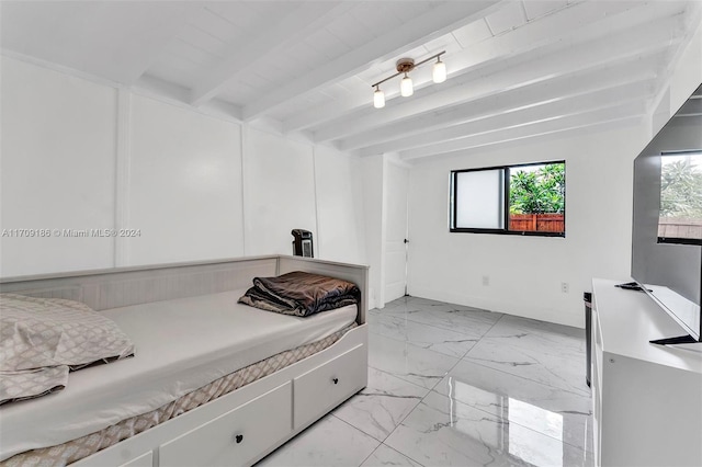 bedroom featuring beamed ceiling and wood ceiling