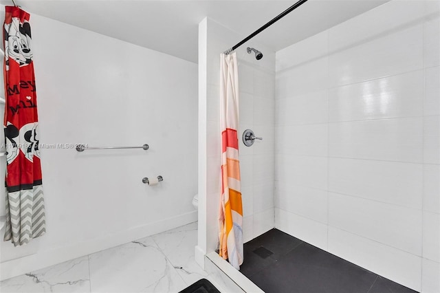 bathroom with toilet and curtained shower