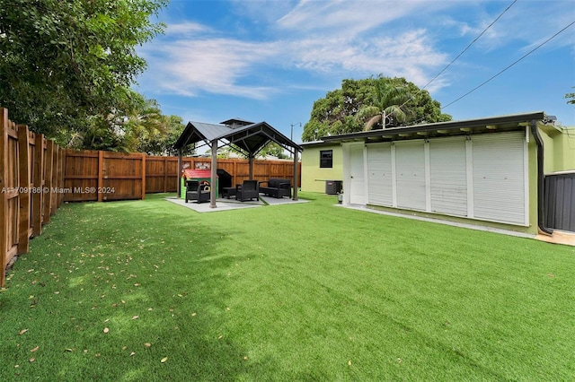 view of yard featuring a gazebo, a patio area, and outdoor lounge area