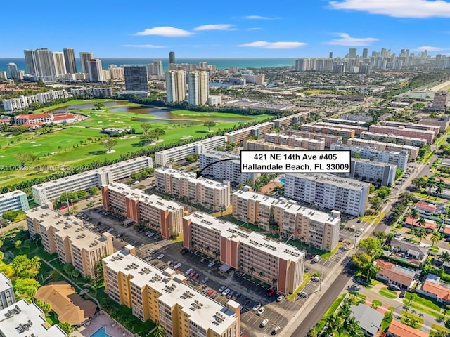 421 NE 14th Ave Unit 405, Hallandale Beach, FL 33009 - bird's eye view of skyline, a nearby body of water, and a golf course
