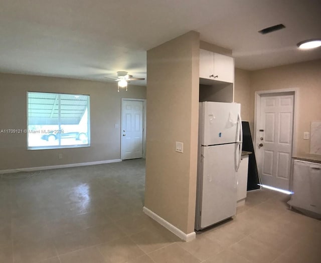 kitchen with white cabinetry, ceiling fan, and white appliances